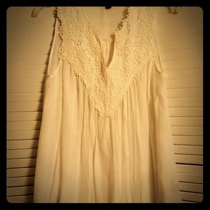 Sleeveless tunic creme colored